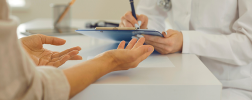 Image of a consultation with a patient sourced from Canva.com